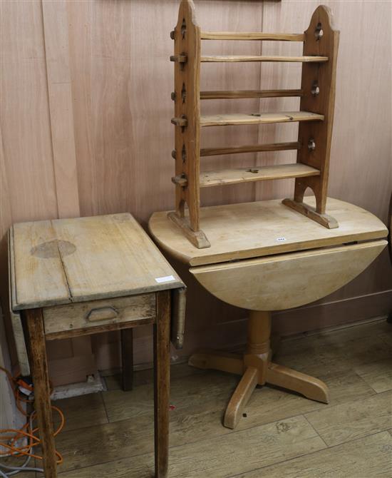 Two drop leaf tables and a three tier bookcase